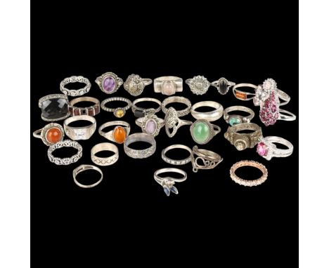 A quantity of silver stone set ringsLot sold as seen unless specific item(s) requested 