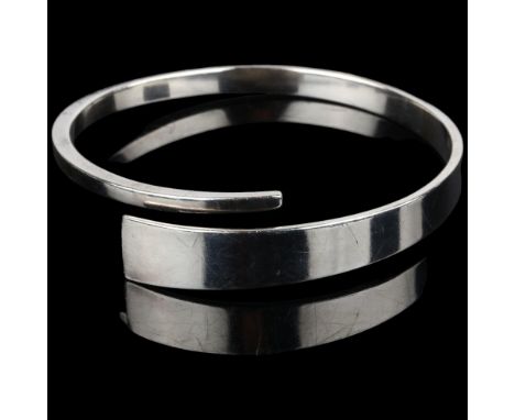 HANS HANSEN - a large Danish modernist sterling silver torque bangle, setting height 12.2mm, internal circumference 22cm, 41.