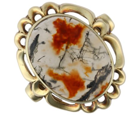 A Continental 14ct gold moss agate dress ring, rub-over set with oval cabochon agate, setting height 22.2mm, size N, 3.7gNo d