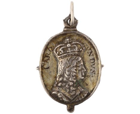 A Charles II (r.1660-1685), Royalist badge pendant, by Thomas Rawlins, crowned bust right, carolvs secvndvs above, reverse en