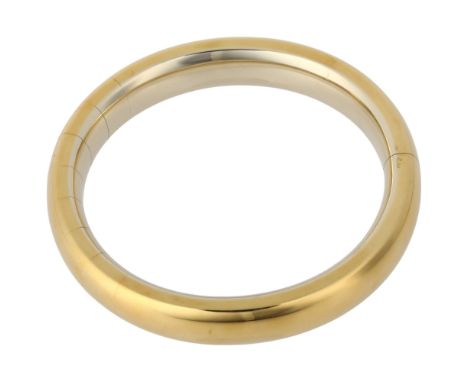 POMELLATO - an Italian 18ct gold 'Iconica' bangle, plain form with sprung fitting, signed Pomellato, band width 12.2mm, inter