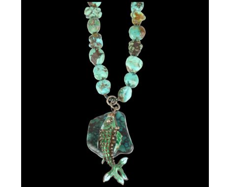 A single-strand graduated turquoise matrix bead necklace, with enamel articulated fish pendant, 36cm, 50gLot sold as seen unl