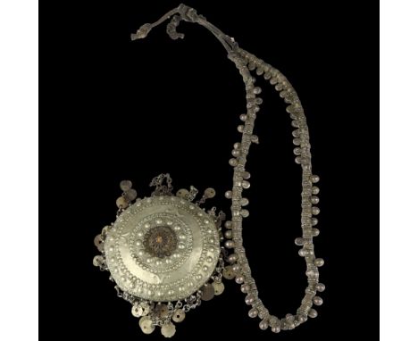A heavy Indian white metal fringe necklace and disc plate, diameter 12cm (2)Lot sold as seen unless specific item(s) requeste