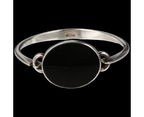 NIELS ERIK FROM - a Danish modernist sterling silver and onyx torque bangle, model no. 13, setting height 25.1mm, internal ci