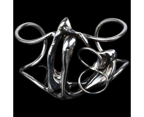 A Danish white metal brutalist abstract cuff bangle, in the manner of Jacob Hull, setting height 47.9mm, internal circumferen