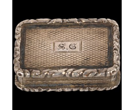 A William IV silver vinaigrette, Gervase Wheeler, Birmingham 1835, rectangular form with allover engine turned decoration, ca