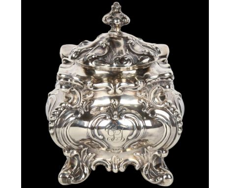 A good quality Edwardian silver Rococo Revival tea caddy, Walker & Hall, Sheffield 1901, shaped square bombe form, with relie