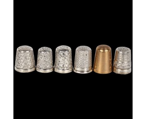 A group of 6 thimbles, including 9ct gold example, 5.8g (6)Lot sold as seen unless specific item(s) requested 