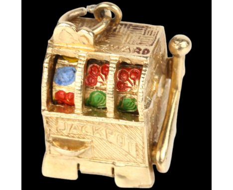 A mid-20th century 9ct gold novelty one-arm bandit slot fruit machine charm/pendant, London 1966, 19.5mm, 9.5gNo damage or re