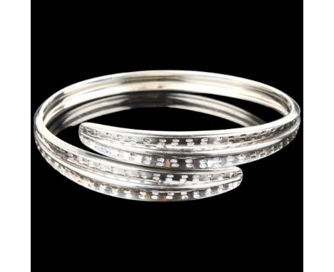 DAVID ANDERSEN - a Norwegian sterling silver Viking Revival torque bangle, a copy of an original from 300AD, setting height 2