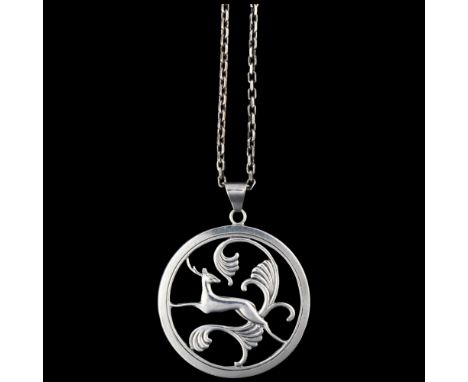An Art Deco Danish silver leaping antelope openwork pendant necklace, indistinctly signed, on sterling cable link chain, pend