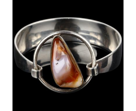 NIELS ERIK FROM - a Danish modernist sterling silver and agate openwork torque bangle, setting height 32.8mm, internal circum