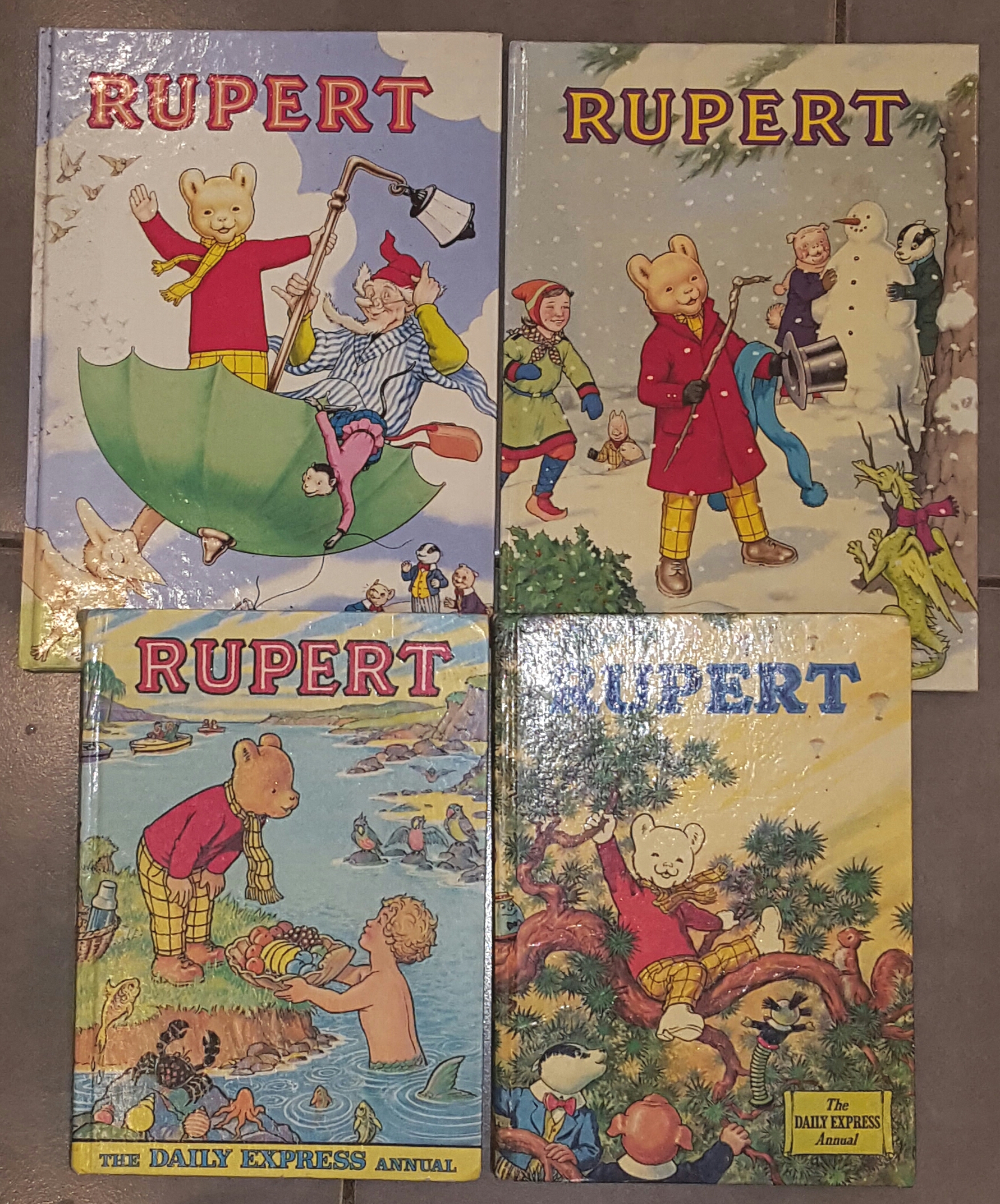 4 Rupert The Bear Annuals 1973, 1975, 1988 and 1989. Part of a recent ...