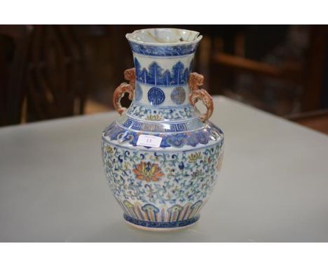 A Chinese porcelain baluster vase, of shouldered form, with iron red scroll handles, bands of lappet, Greek Key and ruyi, the