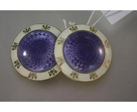 A pair of Edwardian silver-gilt and engine-turned enamel large buttons, Birmingham 1910, each disc centred by a turned lilac 