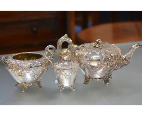 A Victorian Scottish three piece silver tea service, J. McKay, Edinburgh 1843, in the Rococo Revival taste, elaborately chase