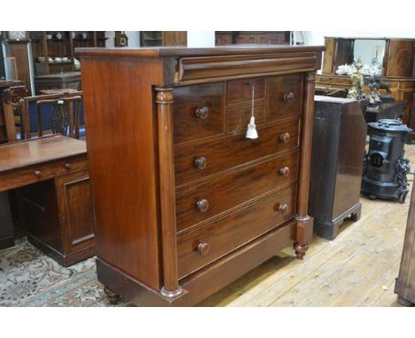 A 19th century mahogany Scotch chest, with frieze drawer above an arrangement of drawers flanked by columns above a base draw