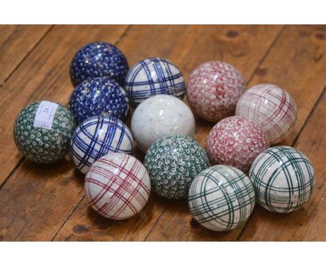 A group of twelve Scottish carpet bowls, second half of the 19th century, decorated in a variety of checked, marbled "millefi