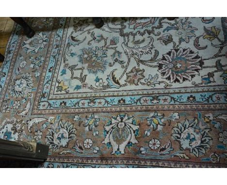 A Ziegler pattern small carpet, the centre panel with leaf and lotus flower trailing design, enclosed within a lotus and flor