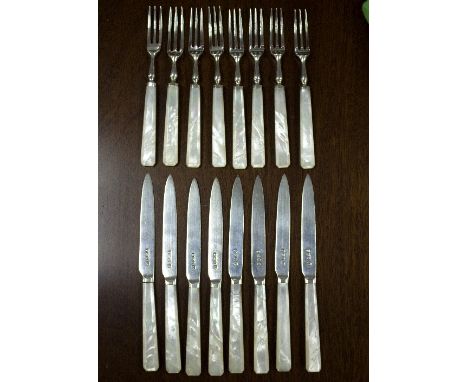 A set of eight silver fruit knives and forks, Sheffield 1926, with mother-of-pearl handles