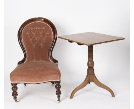 A Victorian button back chair on turned legs and a rectangular table on a turned column and tripod support, 64cm wide