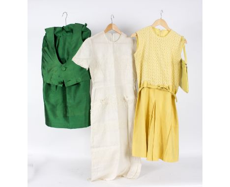 A lady's 1950s vintage dress, of yellow linen with crochet top section, belt and similar bag, an emerald green skirt and top 