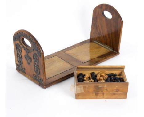 A turned wood chess set and a Victorian walnut book slide