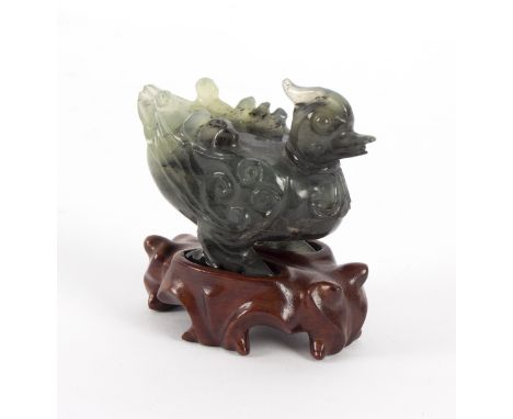 A carved jade figure of a mandarin duck, 20th Century, on a wooden stand