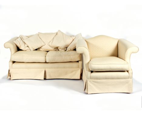 A two-seater sofa with ivory trellis pattern upholstery, fitted loose seat and back cushions, 160cm wide, and a matching armc