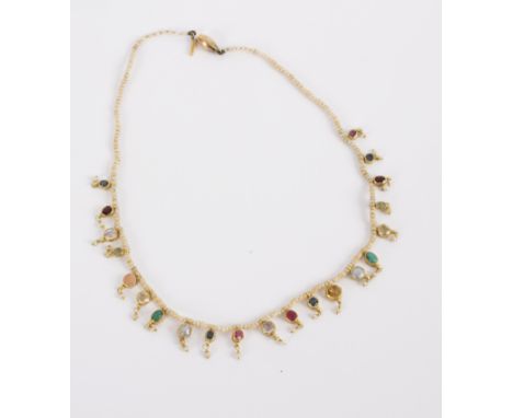 An Indian seed pearl and multi-gem set fringe necklace, each drop suspending a seed pearl, 34cm long/see illustration