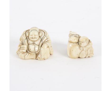 A carved ivory netsuke, 19th Century, depicting a seated figure holding a fan, 4.5cm wide and another depicting a boy playing