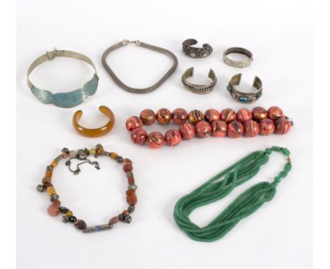 A multi-strand jade beaded necklace, a white metal snake link necklace, a Chinese white metal mounted horn bracelet, bangles 