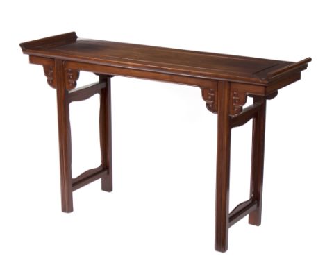 A Chinese hardwood altar table, the rectangular top on moulded legs with corner brackets, 140cm wide/see illustration   Condi