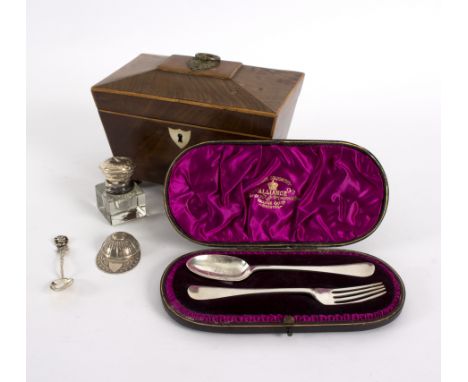 A silver jockey cap caddy spoon, WW, Sheffield 1989, a silver top inkwell and an 800 standard spoon contained in a Regency ma
