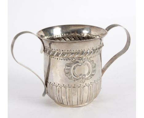 A George III silver porringer, GB, London 1790, with bands of gadrooned decoration and reeded loop handles, 10.5cm high appro