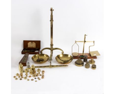 A set of 19th Century brass weighing scales by Degrave & Co, London and a set of postal scales and various weights