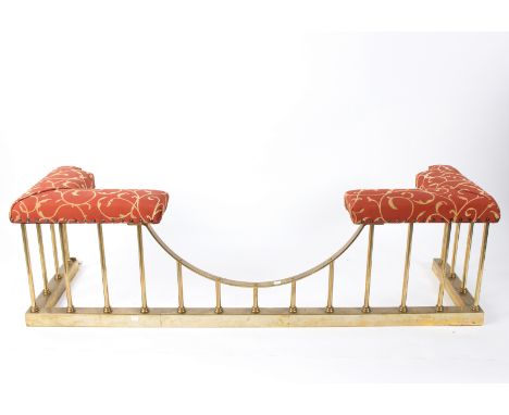 A brass club fender, with button upholstered seat rest, 158cm wide
