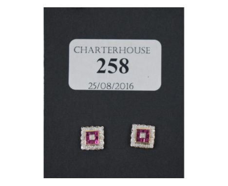 A pair of Art Deco style 9ct yellow gold, ruby and diamond earrings