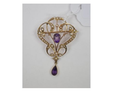 A 9ct gold, amethyst and seed pearl brooch (two seed pearls missing) Condition report Report by NG

Approx. 5.1 g (all in).  