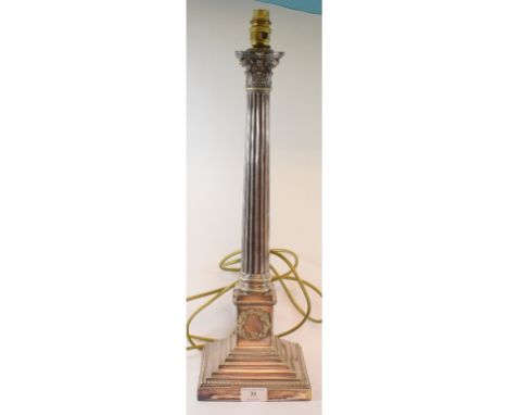 A late Victorian silver plated Corinthian column table lamp, on a stepped square base (adapted for electricity), 56 cm high (