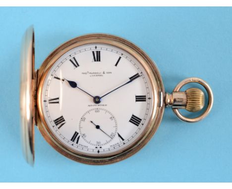 A 9ct gold pocket watch, the white enamel dial with Roman numerals and subsidiary seconds dial, signed Thos Russell & Son Liv