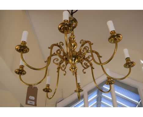 A brass twelve branch chandelier, 72 cm wide, and another similar (2)