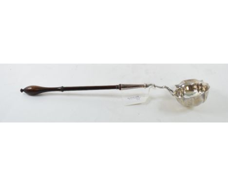 A George II silver toddy ladle, London 1746 (marks rubbed), with fruitwood handle