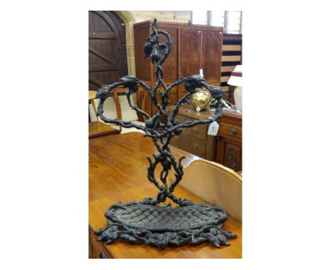 A cast iron stick stand, 56 cm wide