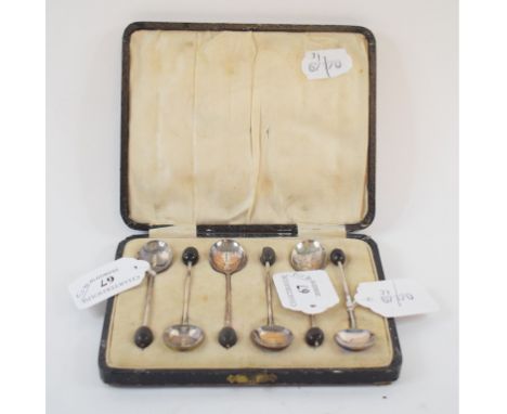 A set of six silver coffee spoons, with coffee bean finials and coloured enamel bowls, Birmingham 1928, cased, and other silv