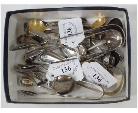 A George III silver caddy spoon, with bright cut decoration, Birmingham 1787, other caddy and condiment spoons, and four sets