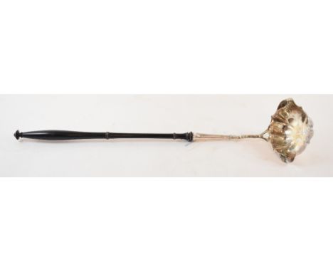 A George II silver toddy ladle, crested, with engraved decoration, London 1748