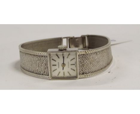 A lady's 9ct white gold Tissot bracelet watch, boxed Condition report Report by GH

The strap is 9ct and the weight is approx