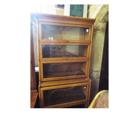 A Globe Wernicke style oak five section bookcase, 87 cm wide