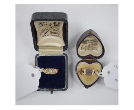 A late Victorian 18ct gold, opal and diamond ring, with three graduated opals and four diamonds, approx. ring size N½, and an